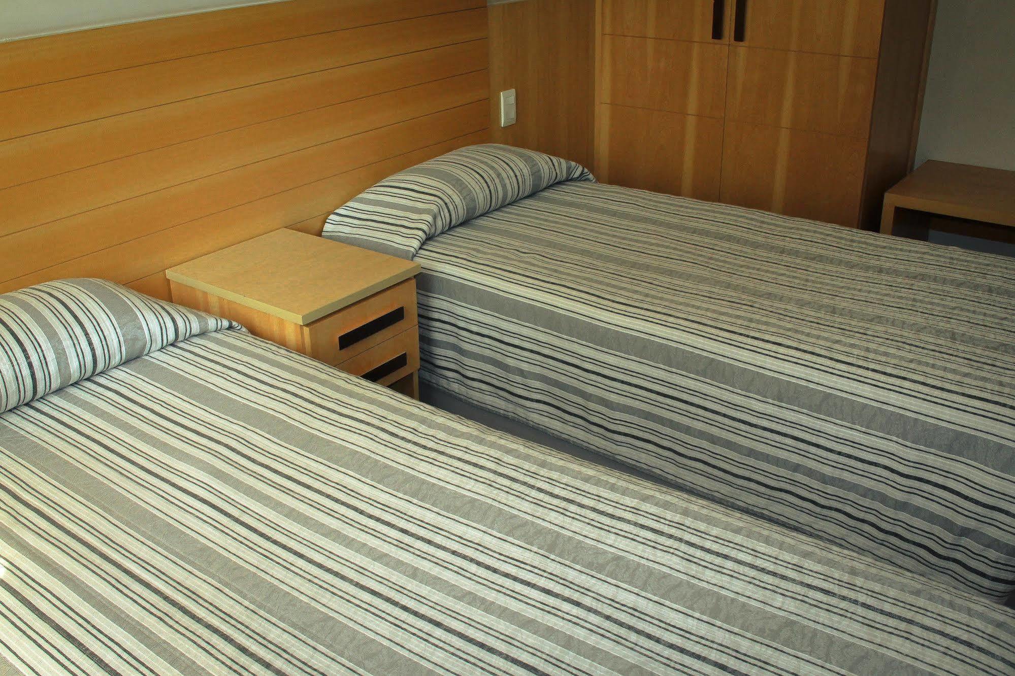 فندق أتلانتيكو تاور ريو دي جانيرو المظهر الخارجي الصورة Two beds in a hotel room