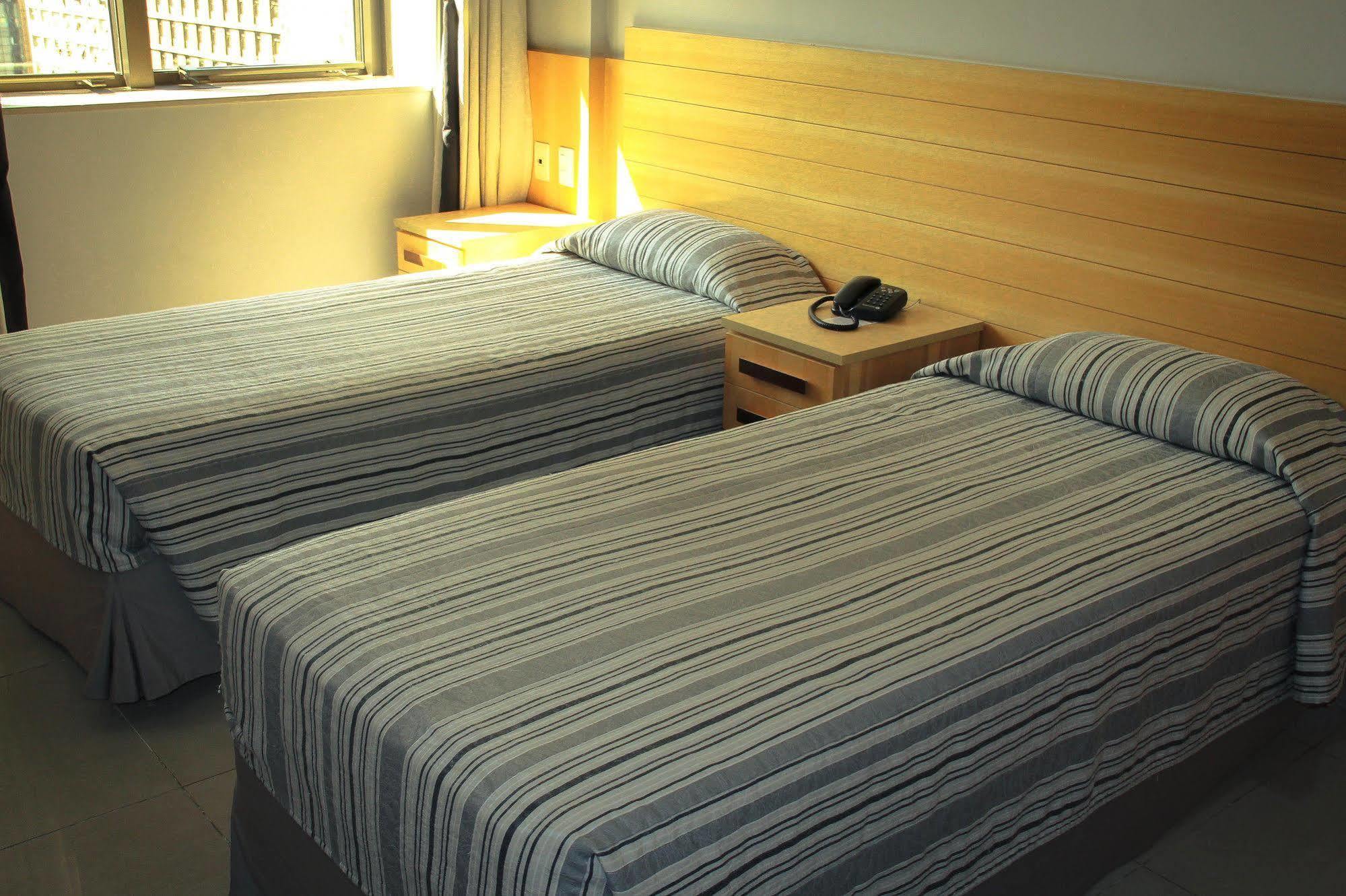 فندق أتلانتيكو تاور ريو دي جانيرو المظهر الخارجي الصورة Two single beds in a hotel room
